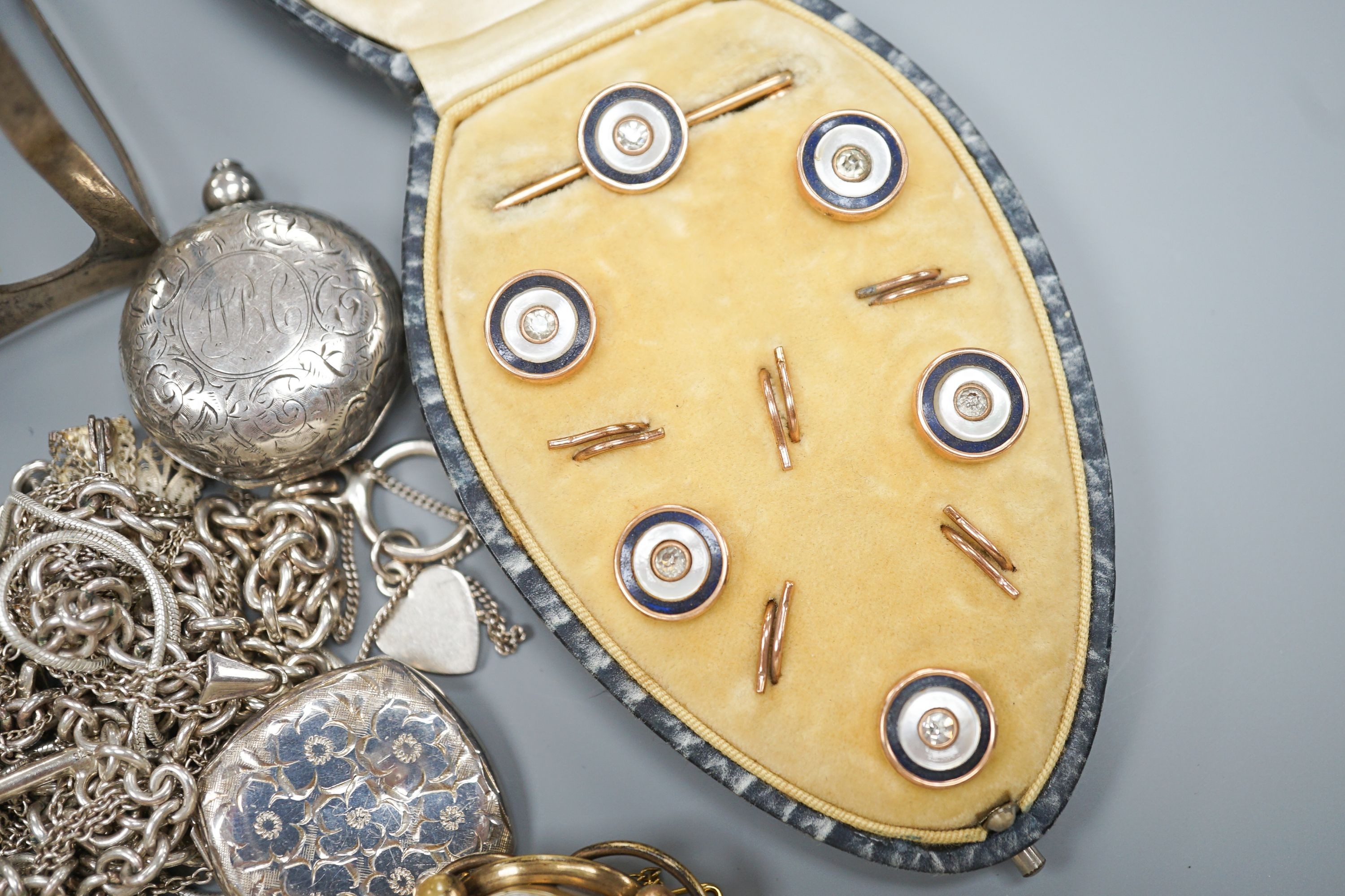 Mixed jewellery including silver and costume, together with a silver toastrack, a silver sovereign case, etc.